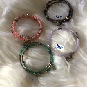 4 brand new beaded bracelets for the price of one.